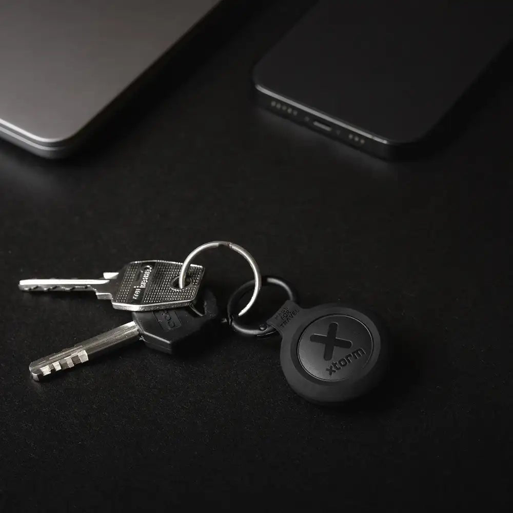 TravelTag for iPhone (iOS) - Water - resistant - Charcoal Black - Xtorm NL